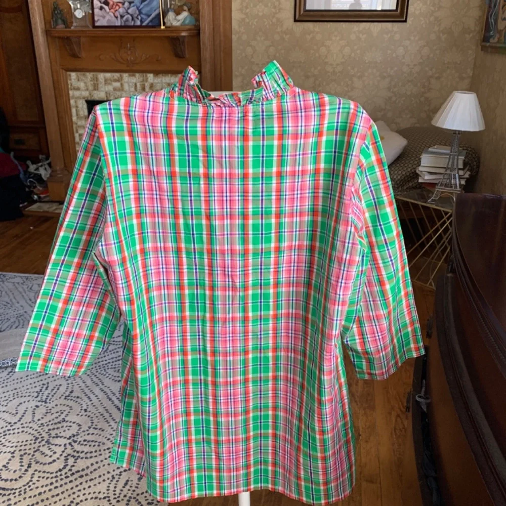 Haley and the hound preppy ruffle neck tunic. Not brand new, but never worn‎